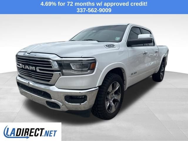 2019 RAM 1500 Laramie in Ivory White Tri-Coat Pearlcoat — front three-quarter view