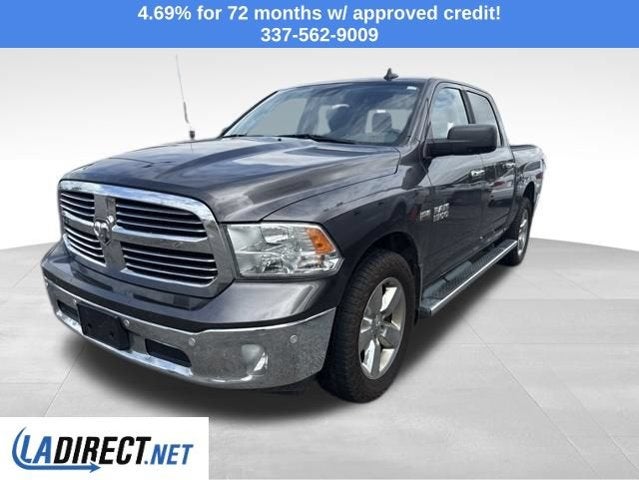 2016 RAM 1500 Big Horn in Granite Crystal Metallic Clearcoat — front three-quarter view
